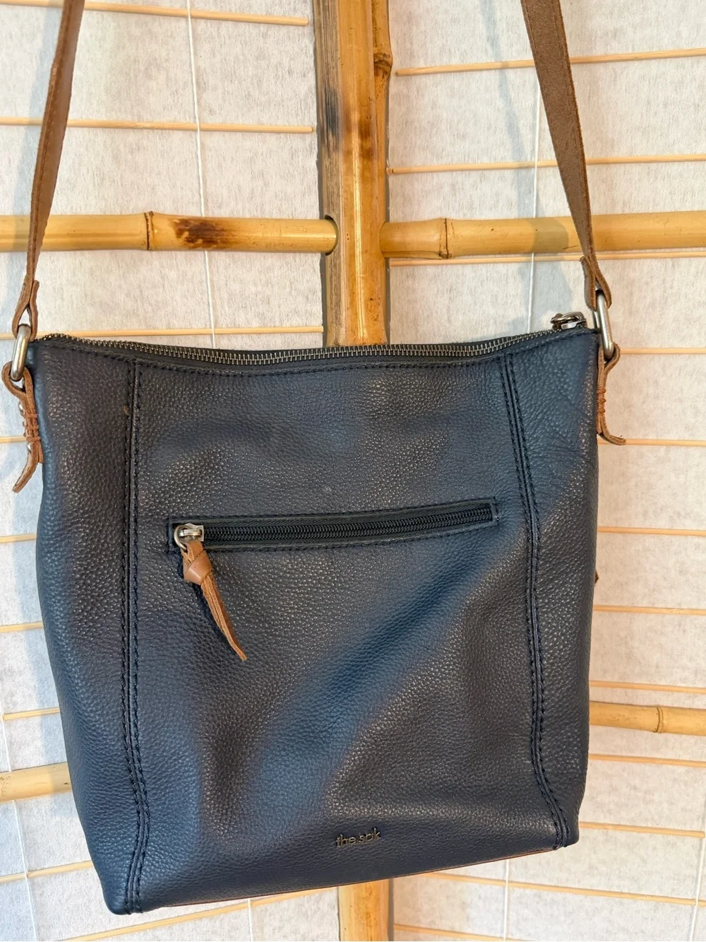 The Sak Navy Crossbody Bag with Brown Strap